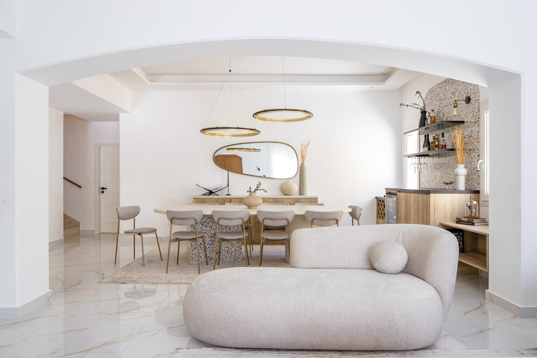 Bright villa living room with a sculpted sofa