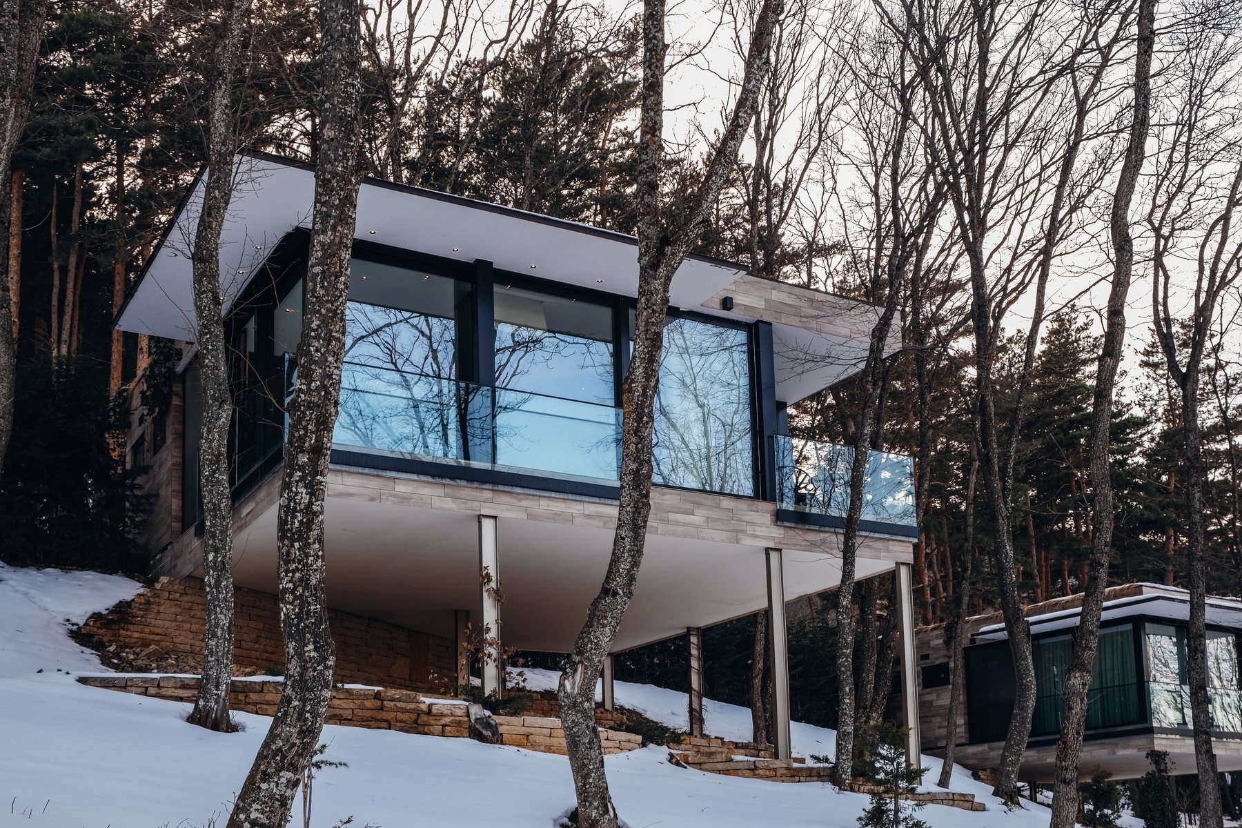 Bioli cabins in a snowy forest